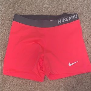 Pink nike spandex compression shorts